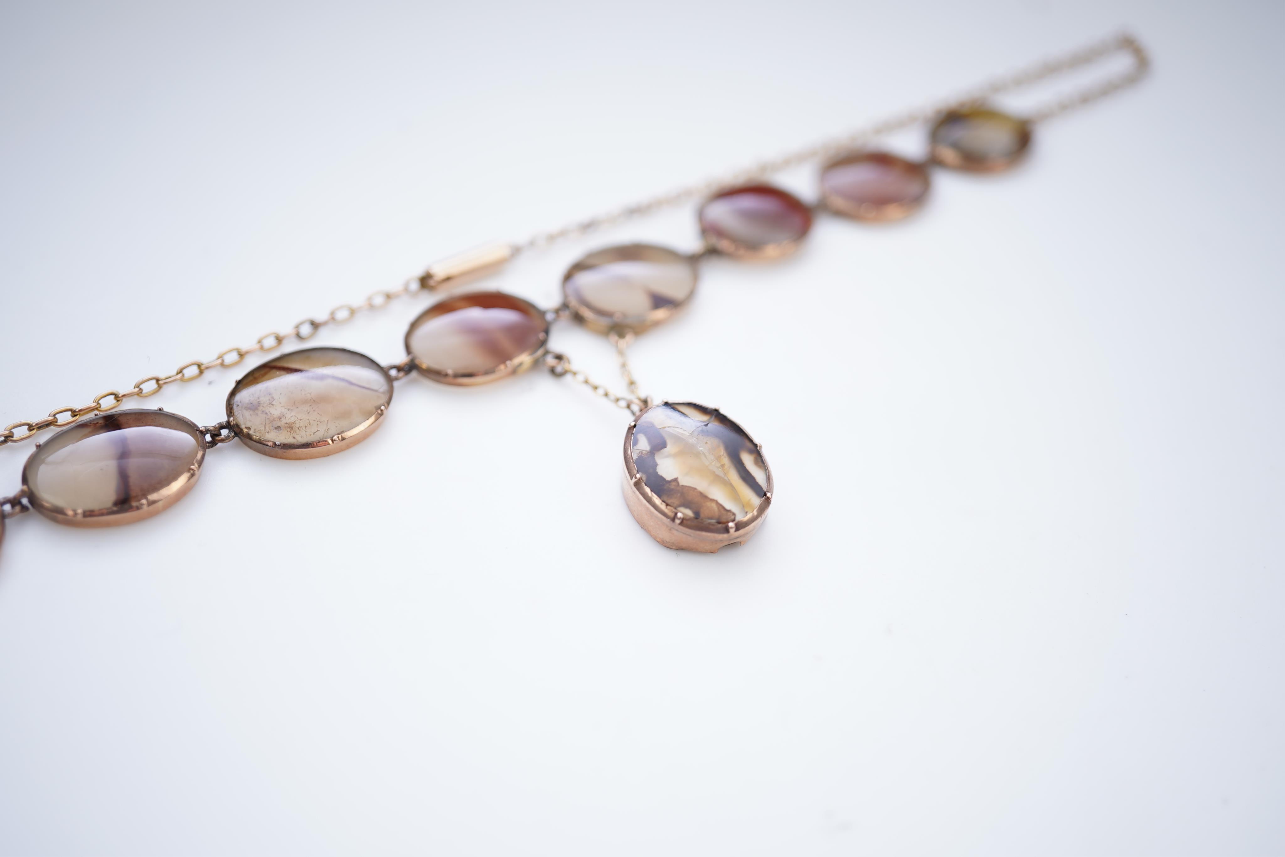 A Georgian agate necklace, early 19th century and later